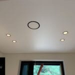 drs 125 diffuser with black inside shade in a modern interior