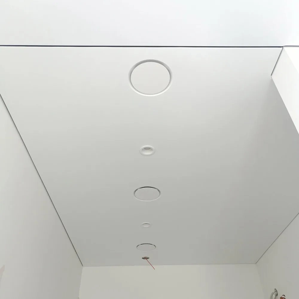 Frameless Conceiling diffusers integrated into a stretch ceiling