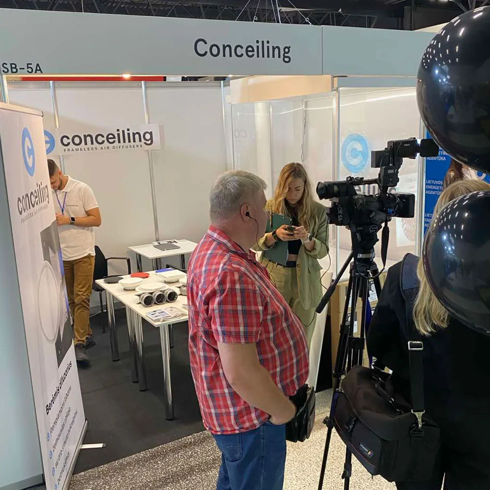 The Conceiling team presenting engineering solutions at a construction trade exhibition